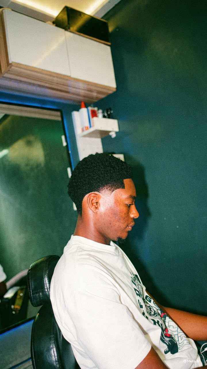 Side profile of a short natural haircut